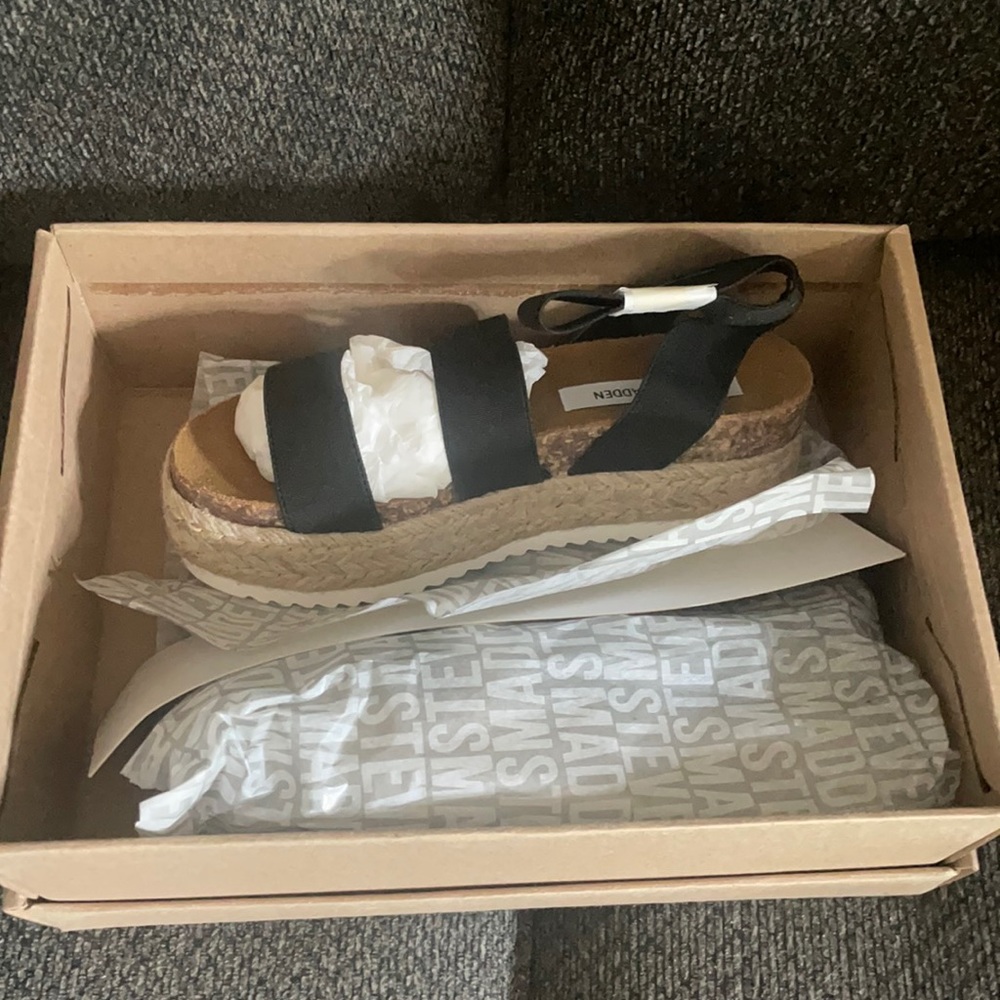 Brand new Steve Madden sandals .